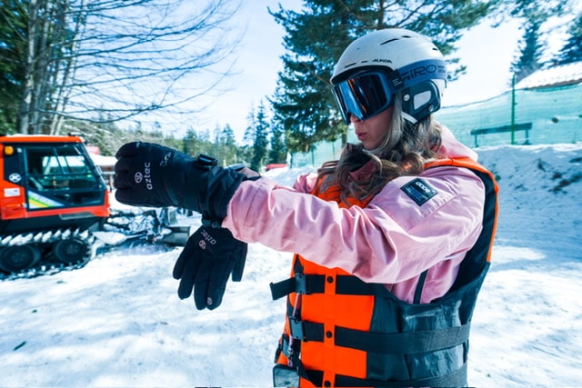Friends preparing for a winter adventure